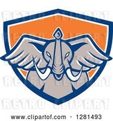 Vector Clip Art of Retro Angry Elephant Head in a Blue White and Orange Shield by Patrimonio