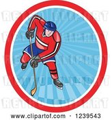 Vector Clip Art of Retro Cartoon Hockey Player in an Oval of Blue Rays by Patrimonio