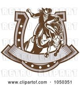 Vector Clip Art of Retro Rodeo Cowboy and Horse Leaping Through a Horseshoe Banner by Patrimonio