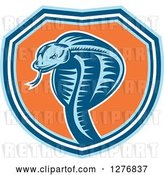 Vector Clip Art of Retro Woodcut Cobra Snake in a Blue White and Orange Shield by Patrimonio