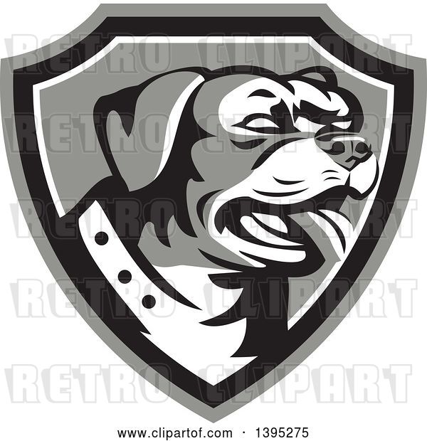 Vector Clip Art of Retro Panting Rottweiler Head in a Shield