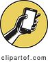 Vector Clip Art of Retro Woodcut Hand Holding a Smart Phone in a Yellow and Black Circle by Patrimonio