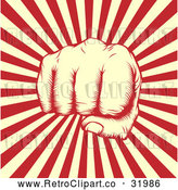 Vector Clip Art of a Retro Revolutionary Fist over Beige and Red Rays by AtStockIllustration