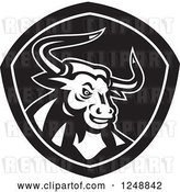 Vector Clip Art of Retro Angry Horned Bull in a Shield by Patrimonio