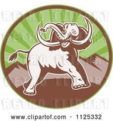 Vector Clip Art of Retro Attacking Elephant over a Circle with Mountains by Patrimonio