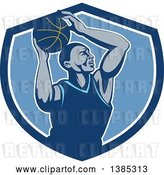 Vector Clip Art of Retro Black Male Basketball Player Doing a Layup in a Blue and White Shield by Patrimonio