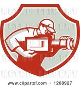Vector Clip Art of Retro Cameraman Filming in a Red White and Taupe Shield by Patrimonio