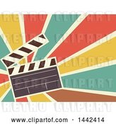 Vector Clip Art of Retro Flat Styled Clapperboard over Rays by BNP Design Studio