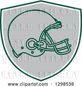 Vector Clip Art of Retro Football Helmet in a Green White and Gray Shield by Patrimonio