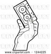 Vector Clip Art of Retro Hand Holding a Cassette Tape by Lal Perera