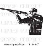 Vector Clip Art of Retro Hunter Holding a Rifle 2 by Patrimonio