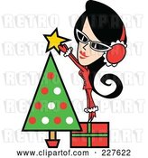 Vector Clip Art of Retro Lady Standing on a Gift and Putting a Star Topper on a Christmas Tree by Andy Nortnik