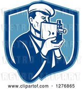 Vector Clip Art of Retro Male Camera Guy Filming in a Blue and White Shield by Patrimonio