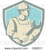 Vector Clip Art of Retro Male Construction Worker Holding a Giant Wrench in a Pastel Shield by Patrimonio