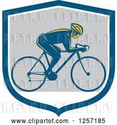 Vector Clip Art of Retro Male Cyclist in a Blue White and Gray Shield by Patrimonio