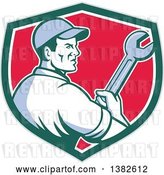 Vector Clip Art of Retro Male Mechanic Holding a Giant Wrench in a Gray Green White and Red Shield by Patrimonio
