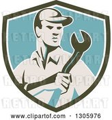 Vector Clip Art of Retro Male Mechanic Holding a Giant Wrench in an Olive Green White and Blue Shield by Patrimonio