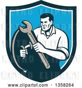 Vector Clip Art of Retro Male Mechanic Holding a Wrench and Shield Inside a Blue and White Shield by Patrimonio