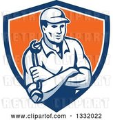 Vector Clip Art of Retro Male Mechanic Holding a Wrench in Folded Arms in a Blue White and Orange Shield by Patrimonio