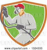 Vector Clip Art of Retro Male Painter Using a Spray Gun and Emerging from an Orange White and Green Shield by Patrimonio