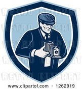 Vector Clip Art of Retro Male Photographer Using a Bellows Camera in a Blue and White Shield by Patrimonio