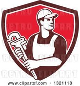 Vector Clip Art of Retro Male Plumber Holding a Monkey Wrench and Looking to the Side in a Brown White and Red Shield by Patrimonio