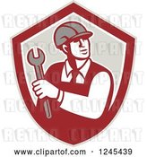 Vector Clip Art of Retro Male Worker Holding a Spanner Wrench in a Shield by Patrimonio