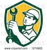 Vector Clip Art of Retro Mechanic Guy Holding a Spanner Wrench in a Green White and Yellow Shield by Patrimonio