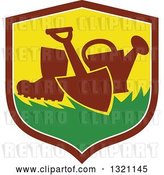 Vector Clip Art of Retro Silhouetted Boot, Spade and Watering Can in a Shield by Patrimonio