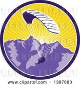 Vector Clip Art of Retro Silhouetted Paraglider Against the Alps Mountains at Sunset in a Circle by Patrimonio