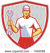 Vector Clip Art of Retro White Male Mechanic Holding a Wrench in a Shield by Patrimonio