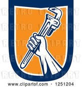 Vector Clip Art of Retro Woodcut Hand Holding up a Spanner Wrench in a Blue White and Orange Shield by Patrimonio