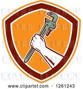 Vector Clip Art of Retro Woodcut Plumber Hand Holding a Monkey Wrench in an Orange Maroon and White Shield by Patrimonio