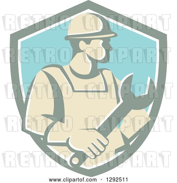 Vector Clip Art of Retro Male Construction Worker Holding a Giant Wrench in a Pastel Shield