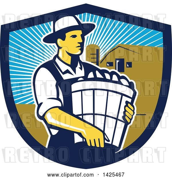 Vector Clip Art of Retro Male Organic Farmer Carrying a Bushel of Harvest Produce, in a Shield Against a Barn and Silo